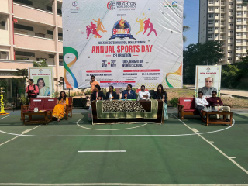 Students marching in sports uniform at SSPM sports event, Kalyan campus