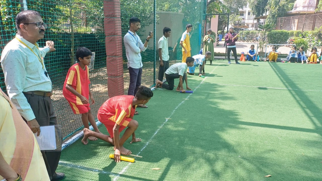 Students playing on professional sports turf